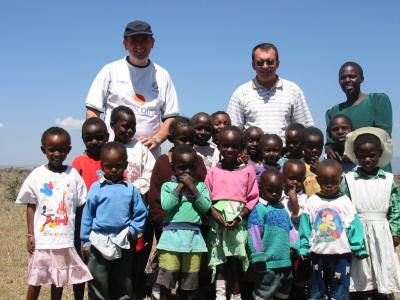 Martin and Fr. Paulo with the Massai school kids in 2002.