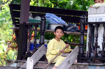 Boy along the canals: Bangkok