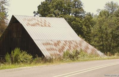 Barn below road