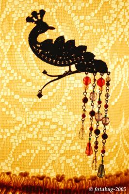 Peacock and beads