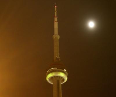 The CN Tower and the moon. I love the haze around everything.