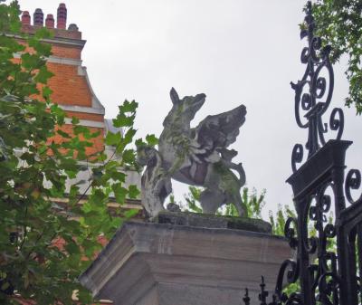A gryphon, symbol of Grays Inn, atop a gate post.