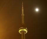 The CN Tower and the moon. I love the haze around everything.