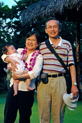 Grandparents with Baby at Luau