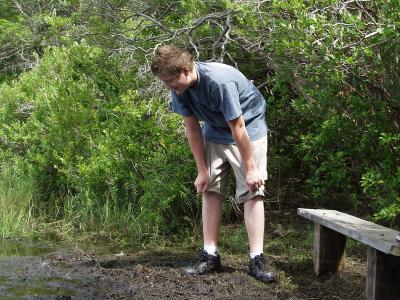Patrick looking for frogs .jpg