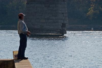 Fishing under the Stone Arch Bridge
