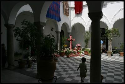 Arcos,cross of flowers in inner court