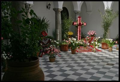 Arcos,cross of flowers in inner court