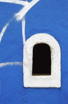 White ticket booth in a blue wall