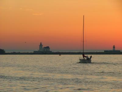 Lighthouse and boat on Lake Erie