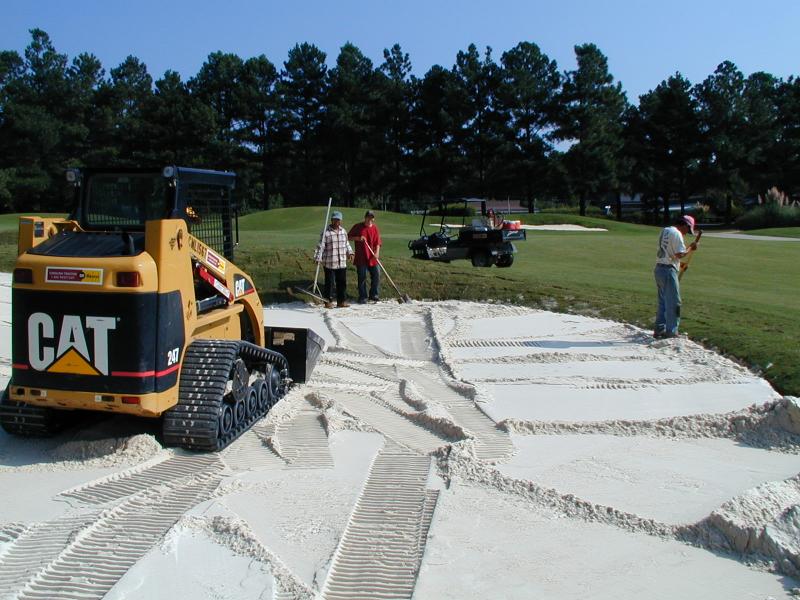 Spence Golf Employees Spreading Sand Layer