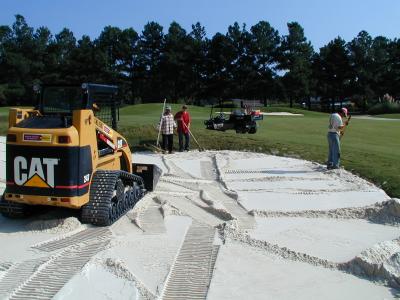 Spence Golf Employees Spreading Sand Layer