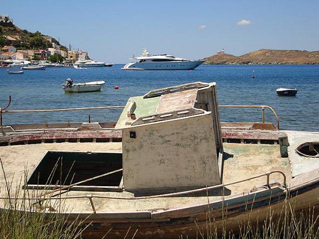 Veteran fishing boat, glamorous yacht