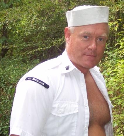 navy manly husband removing shirt