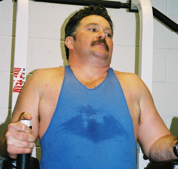 sweaty sweating man gym workout.jpg
