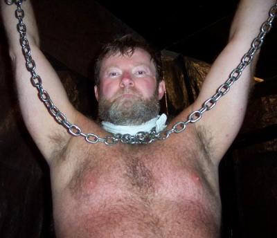 tied torture man bondage dungeon.jpg