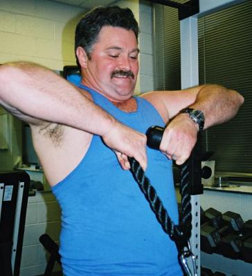 biceps man flexing gym muscle.jpg