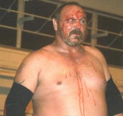 bloodied face fighting wrestling.jpg