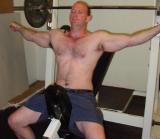 big irishman hairychest lifting weights