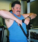 biceps man flexing gym muscle.jpg