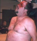 indy pro wrestling bearded man bleeding