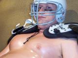 football player laying down cooling off