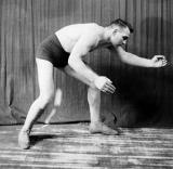 classic vintage pro wrestling man bent over