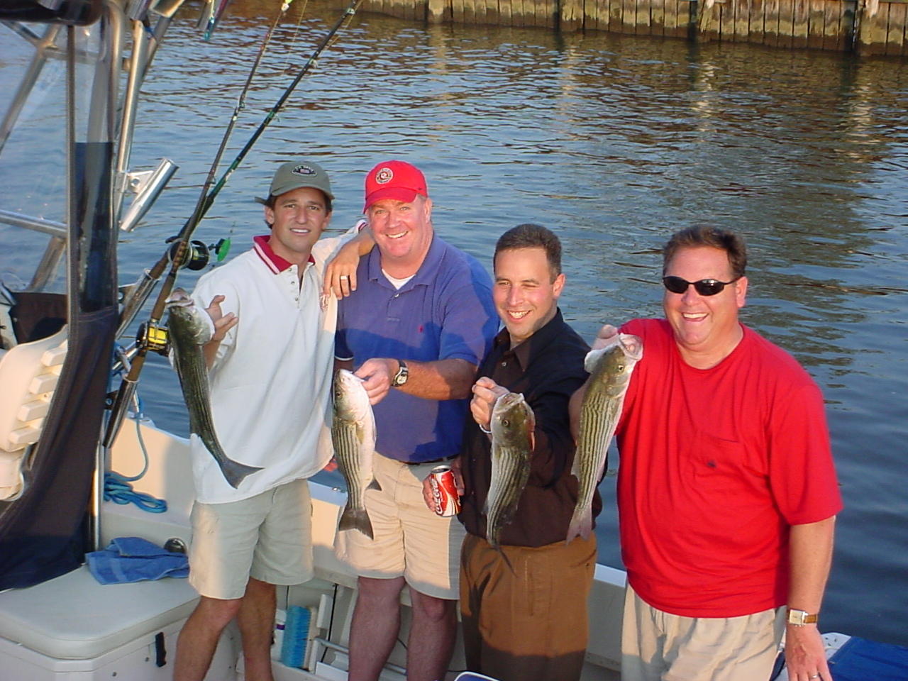 9/1/2005 Rich Becker afternoon charter shows off some of the limit fo Stripers caught off the Magothy onboard the Down Time