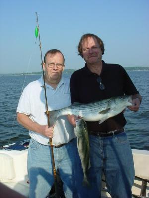 6/24/05 - Mike Keagan Charter - Mike and Dad bring home some nice Stripers from the Bay