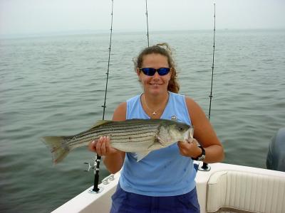 7/1/2005 Jay  Charter - wife shows off a nice release for the IGFA