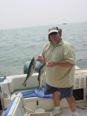 8/14/2005 Stalter Charter with some nice Stripers off Sandy Pt.