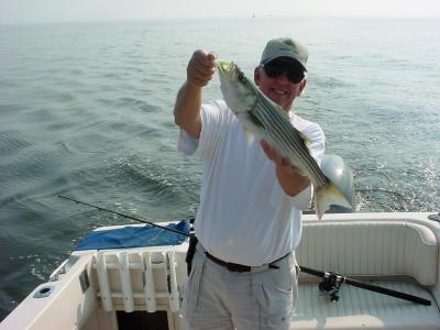9/23/2005 - Florida Chuck shows off nice striper