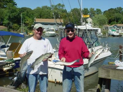 9/28/05 - Dr Ray & Sam show off a good limit