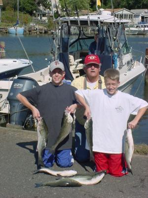 10/15/2005 Crew Family Charter - shows off nice limit of Stripers