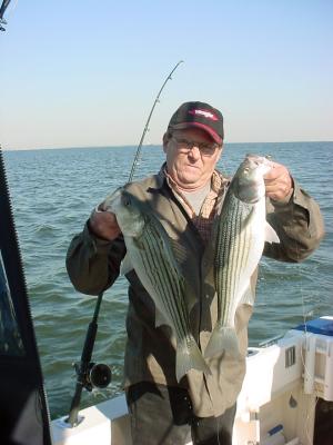 10/18/2005 Wes Naugle Charter -  Dad shows off a set of twins for the box!