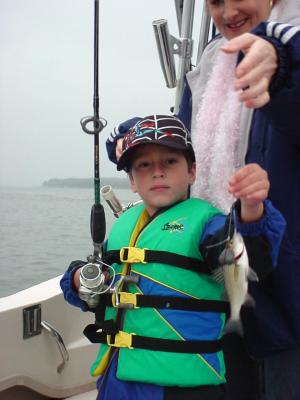 10/21/2005 Summers Charter - John shows off a nice perch