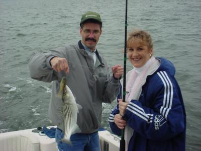 10/21/2005 Summers Charter - Christine with 1st Striper  !