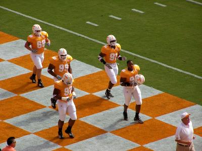 Players recongize Reggie White during the Retirement of number 92 in his honor