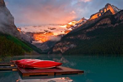 Lake Louise canoes at sunrise