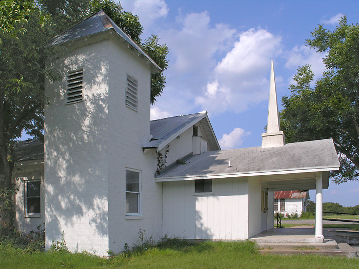 The new church,  with old church visiable