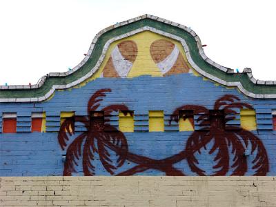 Blue wall and palms