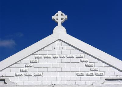 Cross on white wall