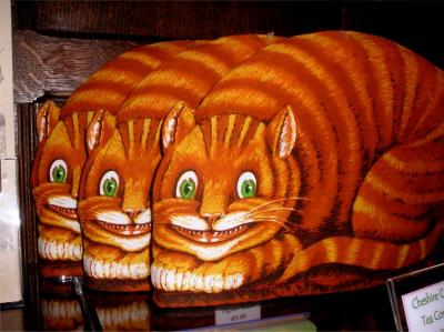 Cheshire cat times 3