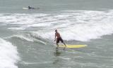 A surfer at Cocoa Beach