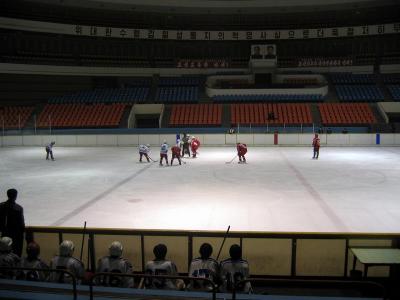 A tournament hockey match.  Players were all girls from 16 to 23.  Note the picture of the two Kims and the lack of spectators.