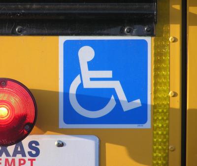Handicap sign on bus.JPG