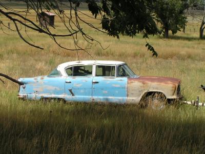Rusted car in field p2.JPG