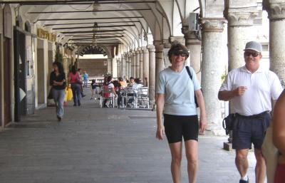 Fred & Cathy in the gallery of Pavia's Piazza Vittoria