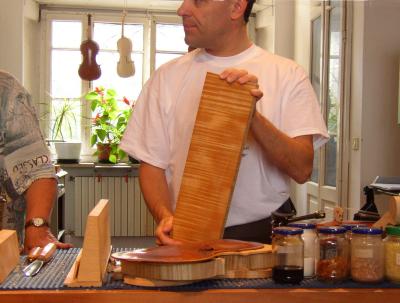 In the shop of violin maker Philippe Devanneaux. Here he is showing a piece of Croatian maple to be used as the back of a violin