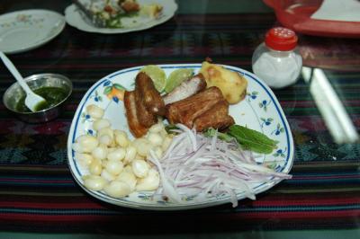 Chicharronnes (fried pork, fried potato, boiled corn, & raw onion)